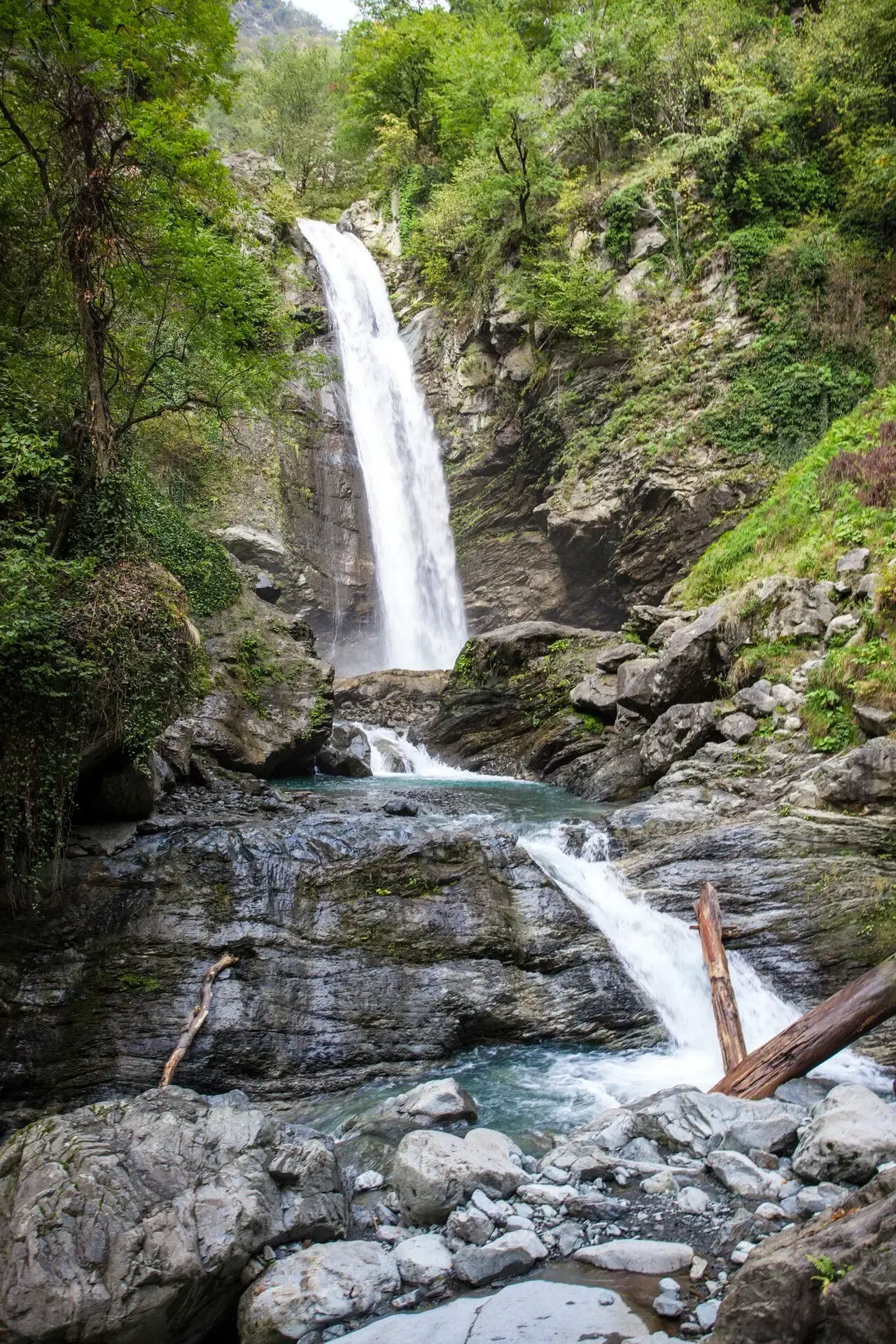 Ninoskhevi waterfall in a rocky forest gorge